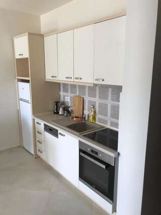 Гостевой дом APARTMENTS TOMIĆ Бечичи Улучшенный люкс с видом на море-23